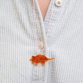 Triceratops acrylic necklace with waxcord - Orange